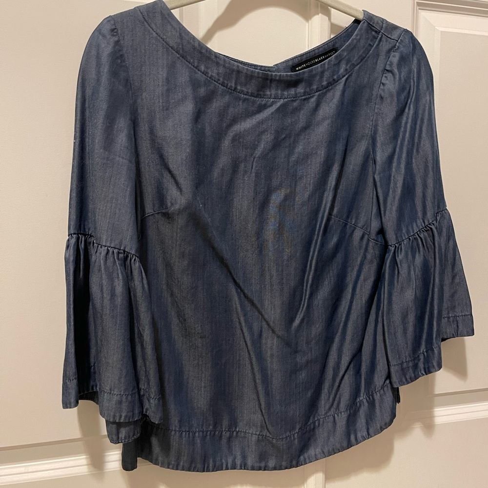 White House Black Market blues blouse. In excellent condition. Size: 4